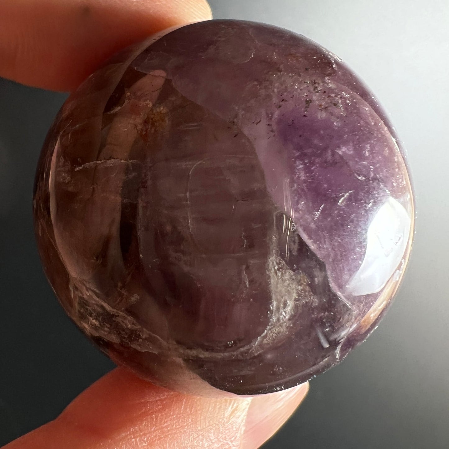 Super Seven Kugel 39mm violett-transparent mit Einschlüssen, poliert | Happy Minerals