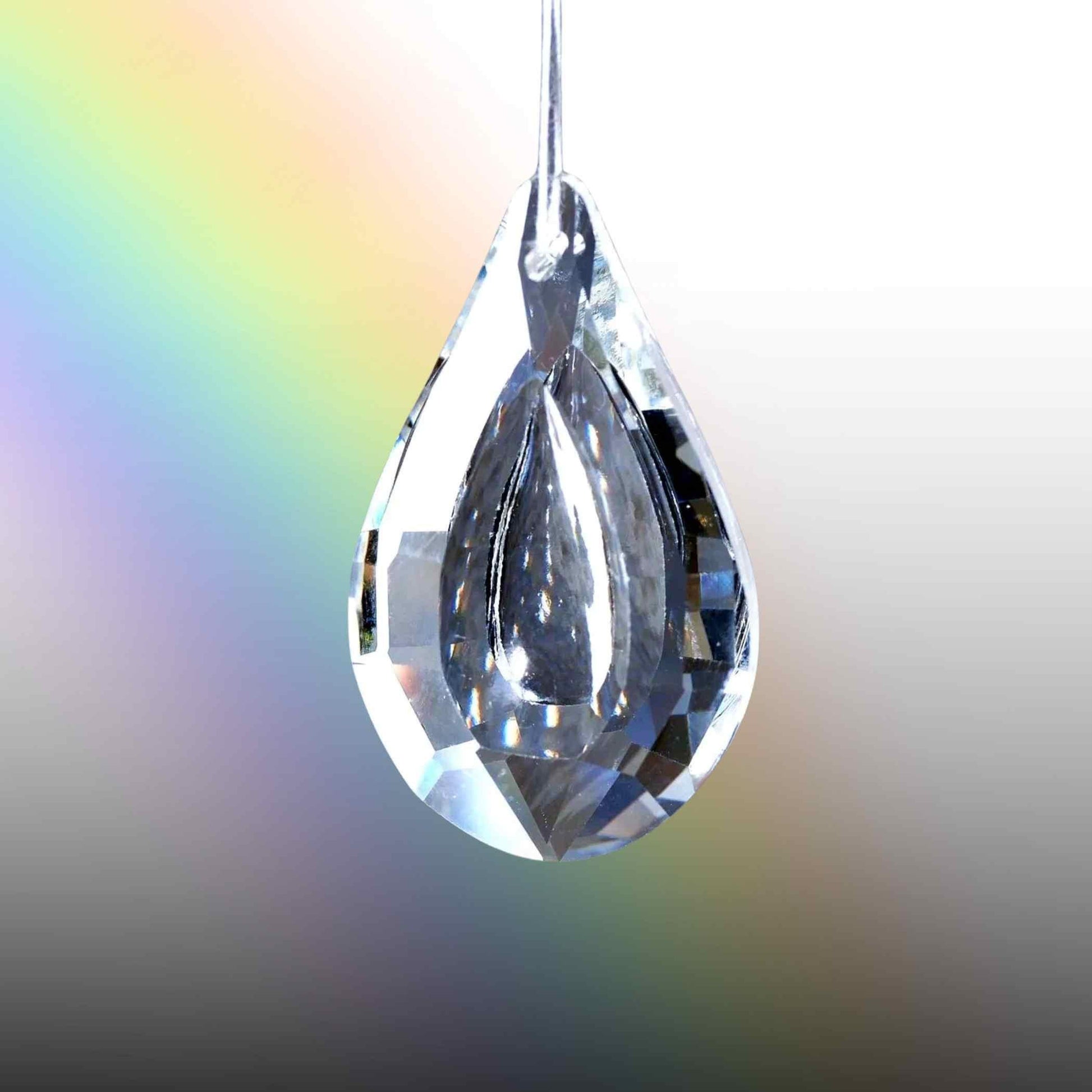 Feng Shui Glaskristall in Form eines Pfauenauges, ca. 45mm.