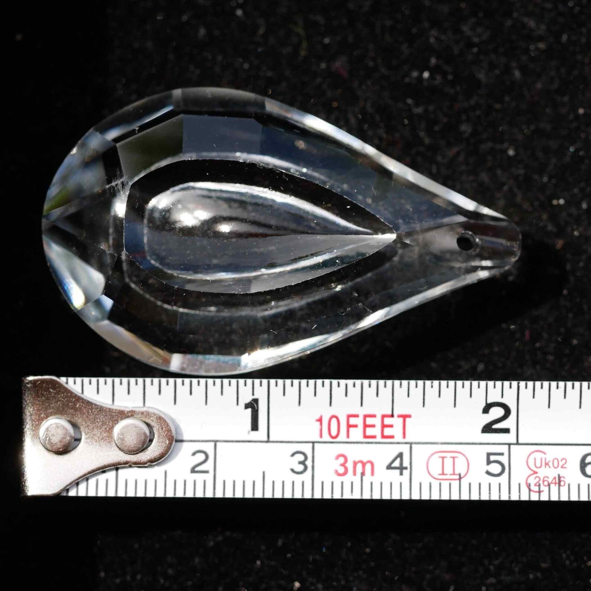 Sonnenfänger aus K9 Glaskristall in Pfauenauge Form mit Maßband | Happy Minerals