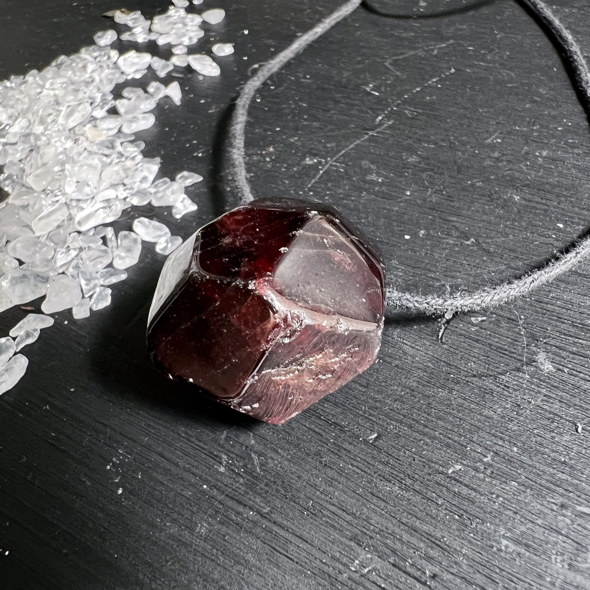 Red almandine garnet crystal pendant with natural crystal faces | Happy Minerals