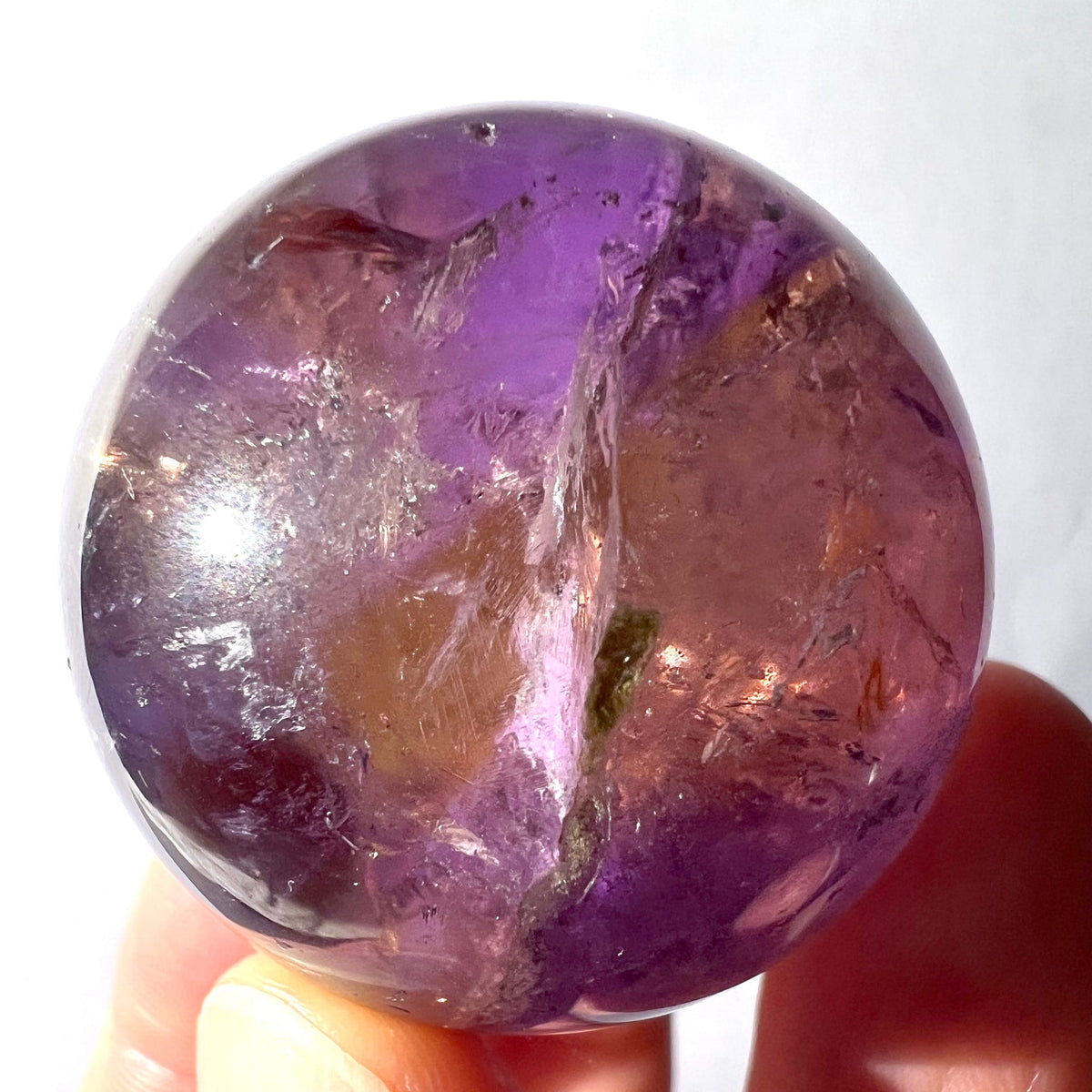 Ametrin Kugel poliert mit violetten und honigfarbenen Zonen, silbrigen Glanzflaechen und Einschluessen | Happy Minerals