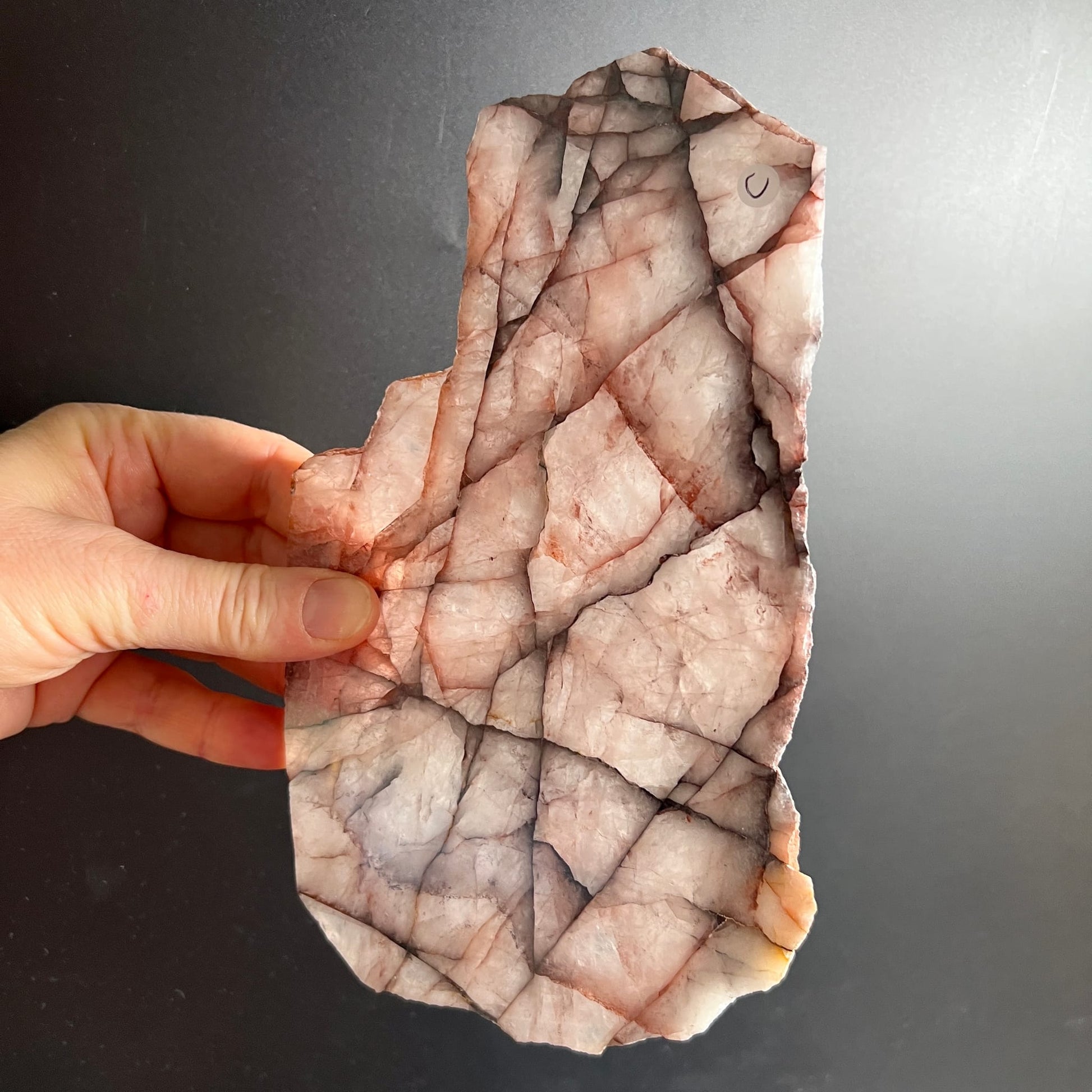 Feuerquarz | Variante | C | in | Hand | gehalten | Hematoid | Quarz | Platte | Madagaskar | Happy | Minerals