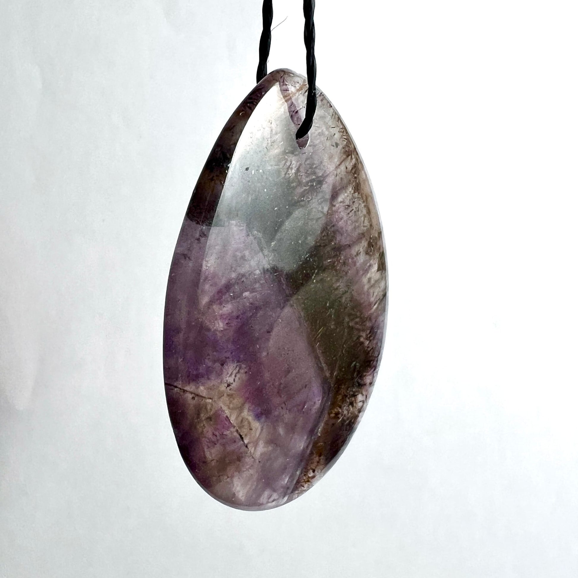 Super Seven Anhänger oval poliert, lila-grün-braun, transparente Einschlüsse, 42x33mm | Happy Minerals