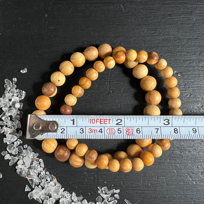 Palo Santo Armband | runde Perlen | mit Maßband vermessen | warme Honigtöne | Peru | Happy Minerals | Variante A