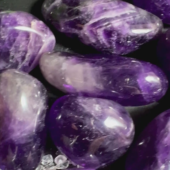Sammlung violetter Dream Amethyst Trommelsteine XL