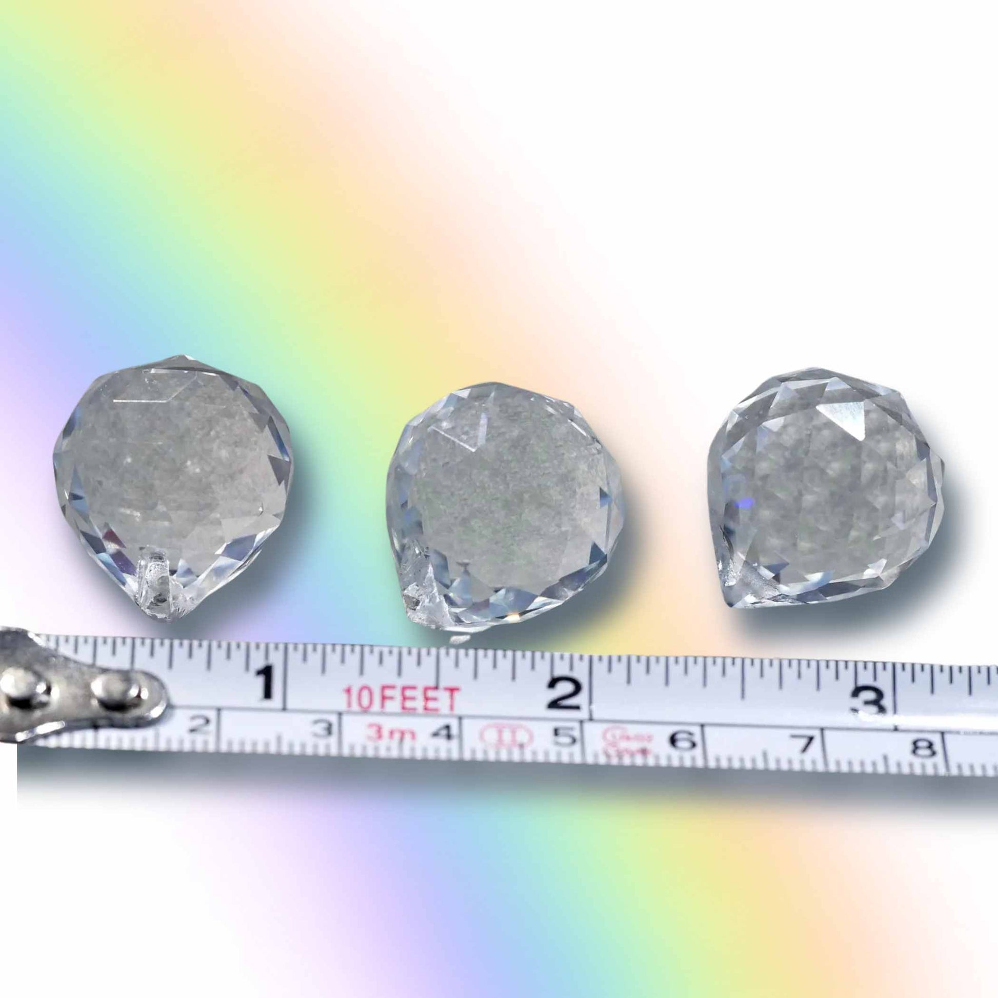 Regenbogenkristall Set Groessenvergleich 2 cm kleine Kugeln