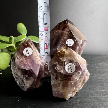 Super Seven Melody Stone | Variante A B C mit Massband | ca. 7 cm | violett braun rauchig | Happy Minerals